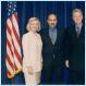 Photo of Clinton with man she is trying to discredit Obama for dealing with